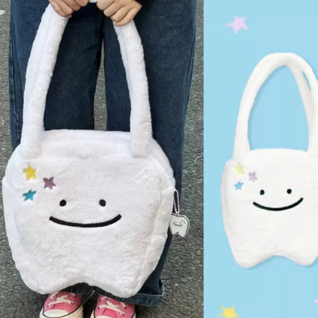 White plush large tooth shoulder tote bag with zipper closure and unisex design