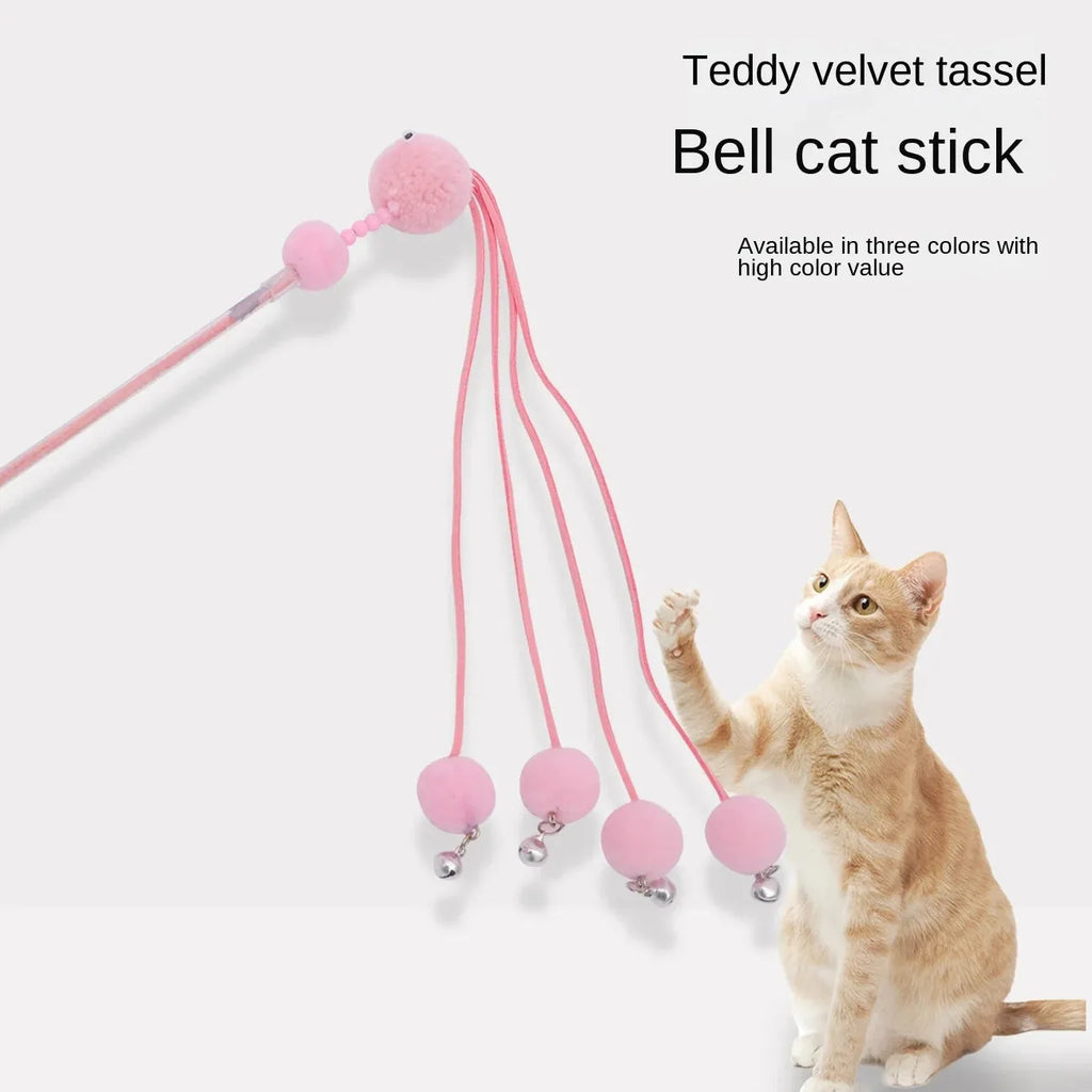 Pipitao funny cat stick toy with blue tassel on a carpet for pet play