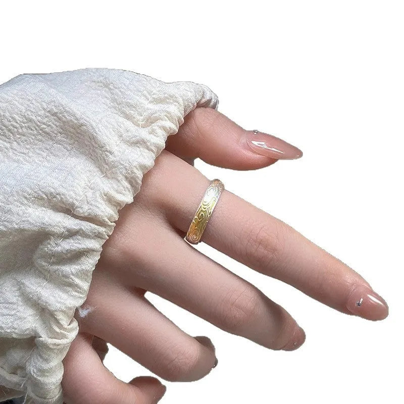 Xiangyun pattern open mouth ring with electroplated silver gold finish showing geometric fairy-style design