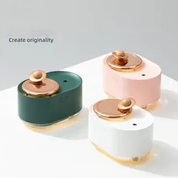 Planet-shaped humidifier with night light in green, pink or white colours for small spaces