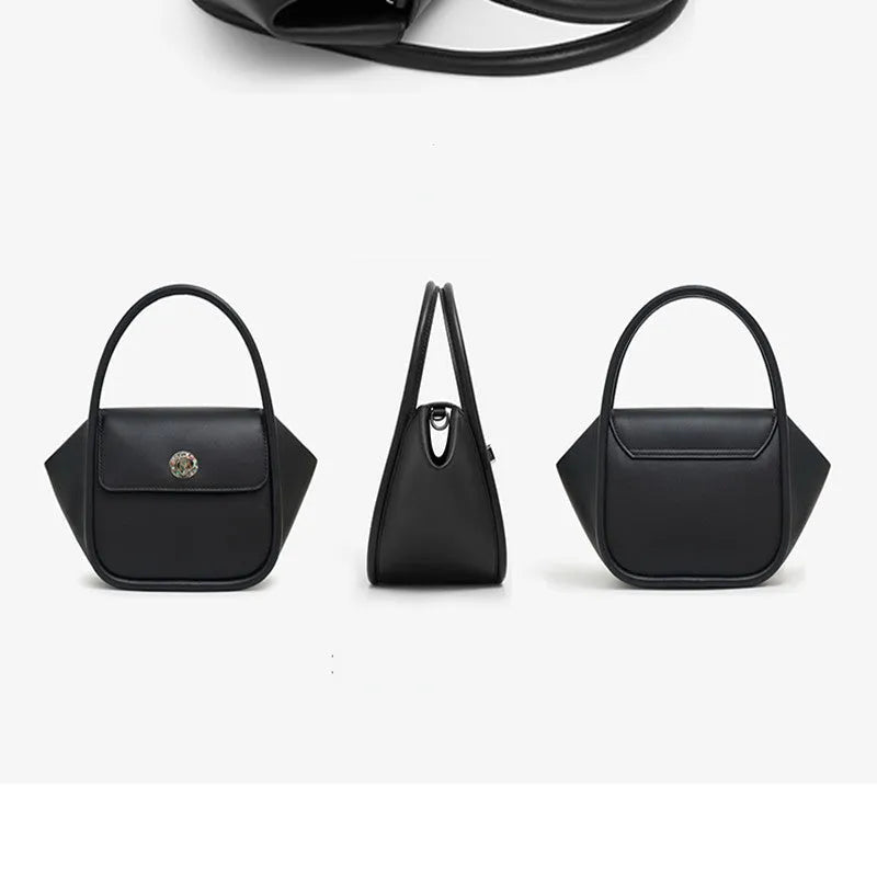 Soft wing-shaped leather cross-body tote bag in cow leather with a buckle and latch closure.