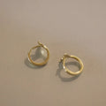 S925 sterling silver fishtail earrings with 14k gold plating in gold and white gold colours.