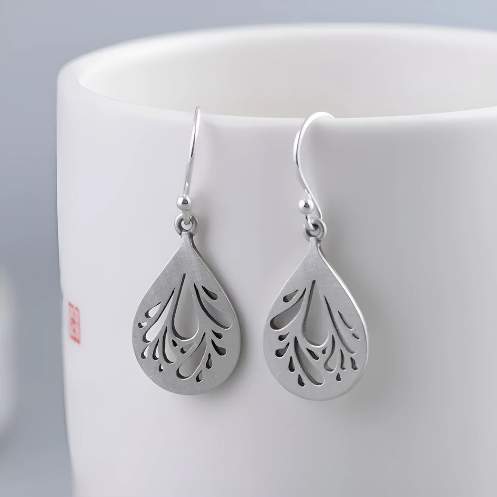 Retro 925 silver hollow water drop shape earrings for women, small stud style with hand ground finish
