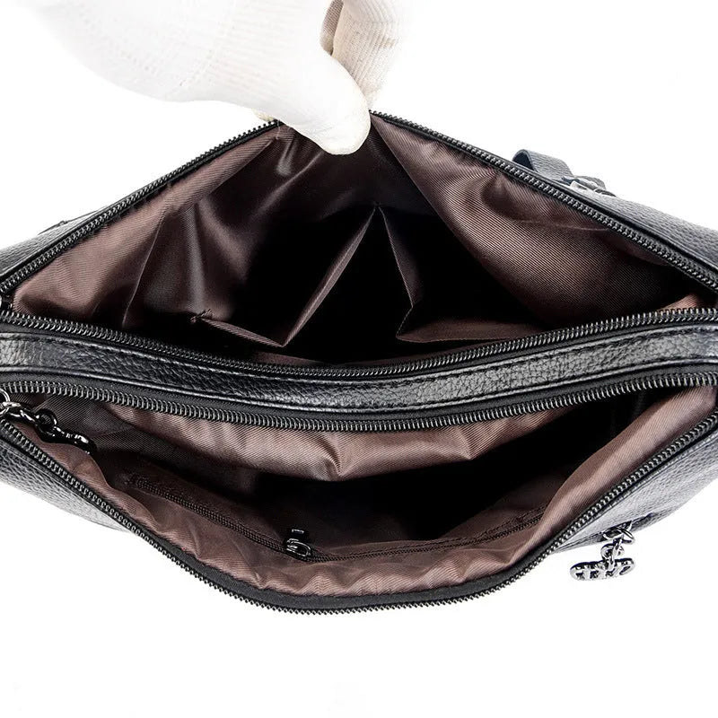Genuine leather horizontal square shoulder messenger bag with stitching and contrast colour details in black