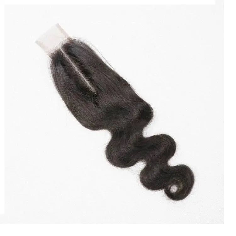 A straight, natural-coloured human hair wig for women on a stand, showing its length and hand-woven construction.