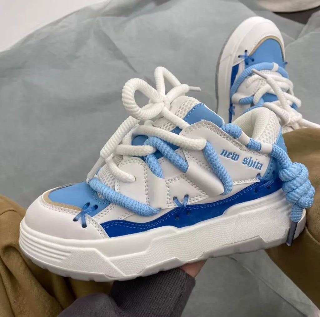 Women's grey thick sole retro platform sneakers with lace-up front and round toe