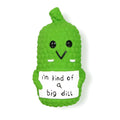 Green pickle-shaped latex dog squeaky toy with textured surface for chewing.