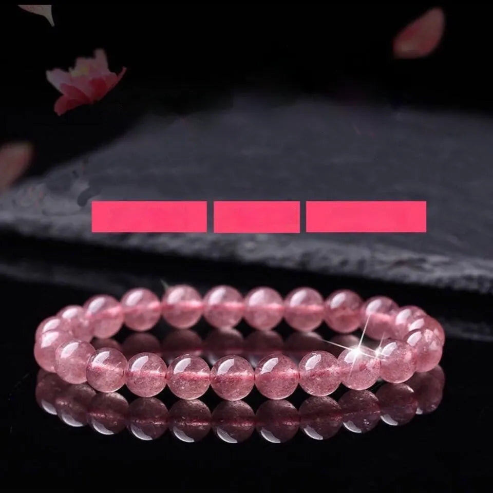 Polished strawberry quartz crystal bracelet for women in 6mm, 8mm and 10mm bead sizes.