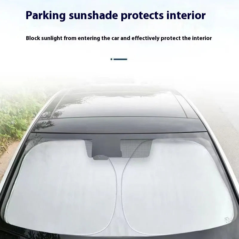Aluminium foil car windscreen sunshade in silver, showing reflective surface.
