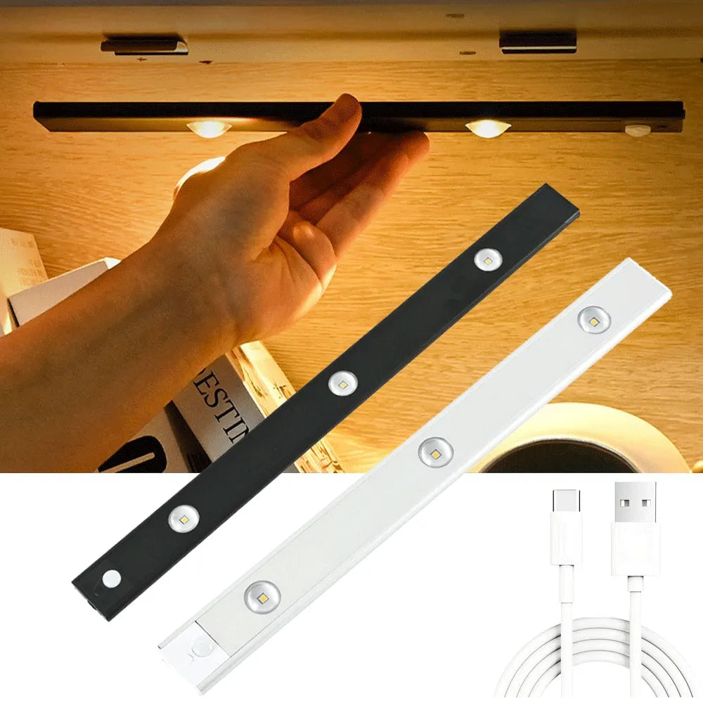 Ultra-thin USB LED night light with motion sensor in silver, aluminium body, 20 cm length, mounted inside a kitchen cabinet