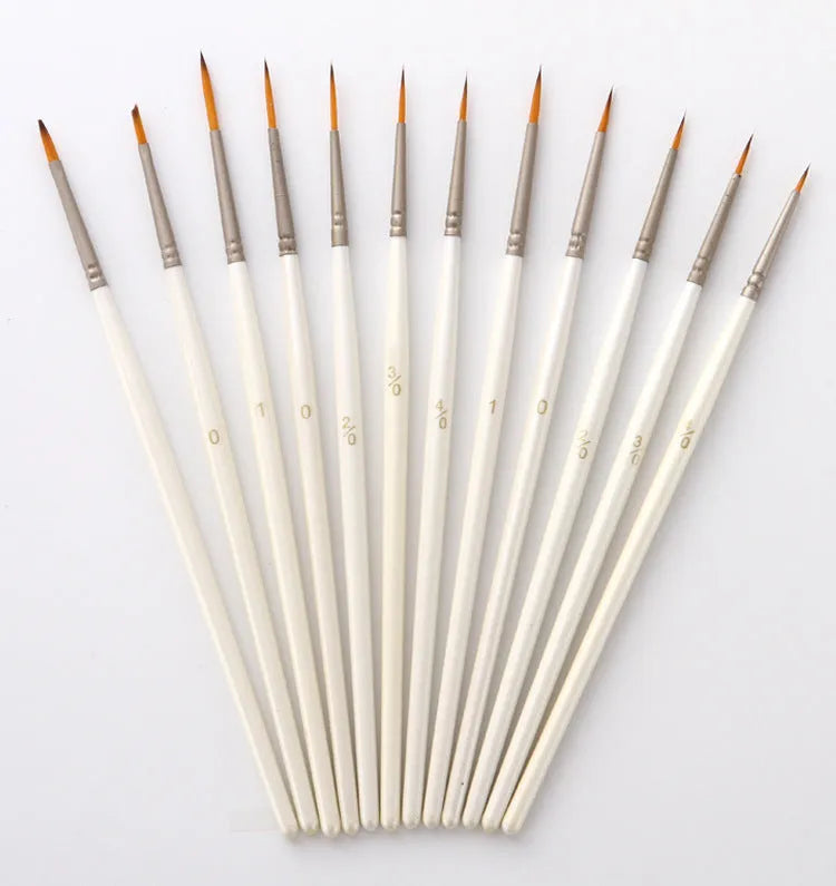 Set of 12 Pearl White handled artist paint brushes with nylon wool heads, sizes 000 to 4/0.