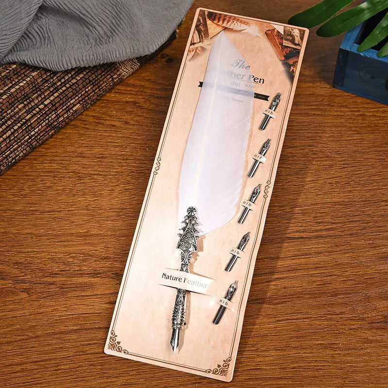 Vintage feather dip pen in ten colours with zinc alloy casing measuring 30×13×4 cm