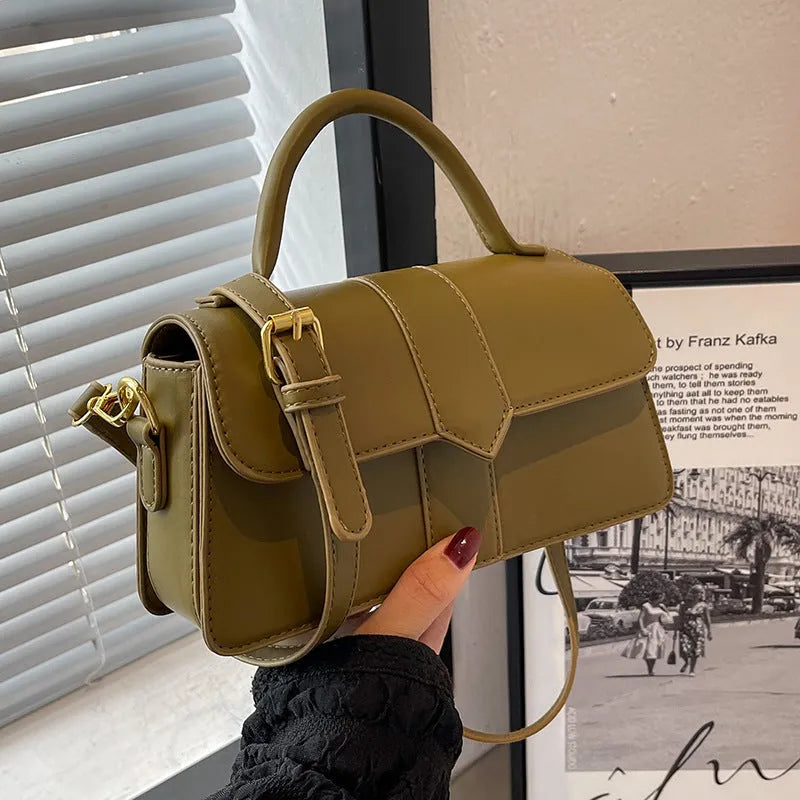 Women's PU leather messenger bag with horizontal square design measuring 22cm wide