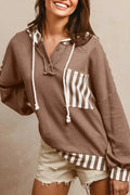 Straw yellow women's hoodie with waffle texture, patchwork stripes, a drawstring hood, and button neck.