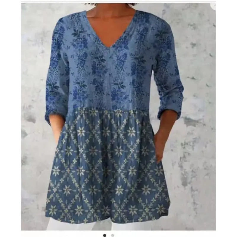 Women's printed loose dress with 3/4 sleeves and wide waist design in floral pattern