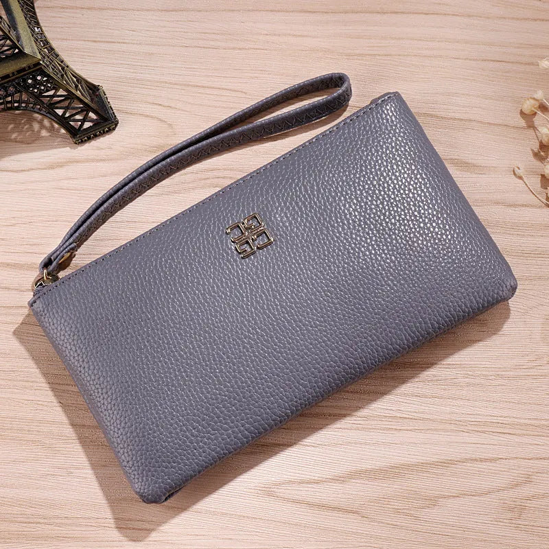 Long 55-inch PU leather phone wallet zipper handbag in solid colour with sewing line detailing