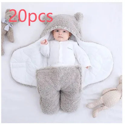 Baby quilted sleeping bag wrapper in cotton blend fabric with polyester cotton filling, shown in one of six colours