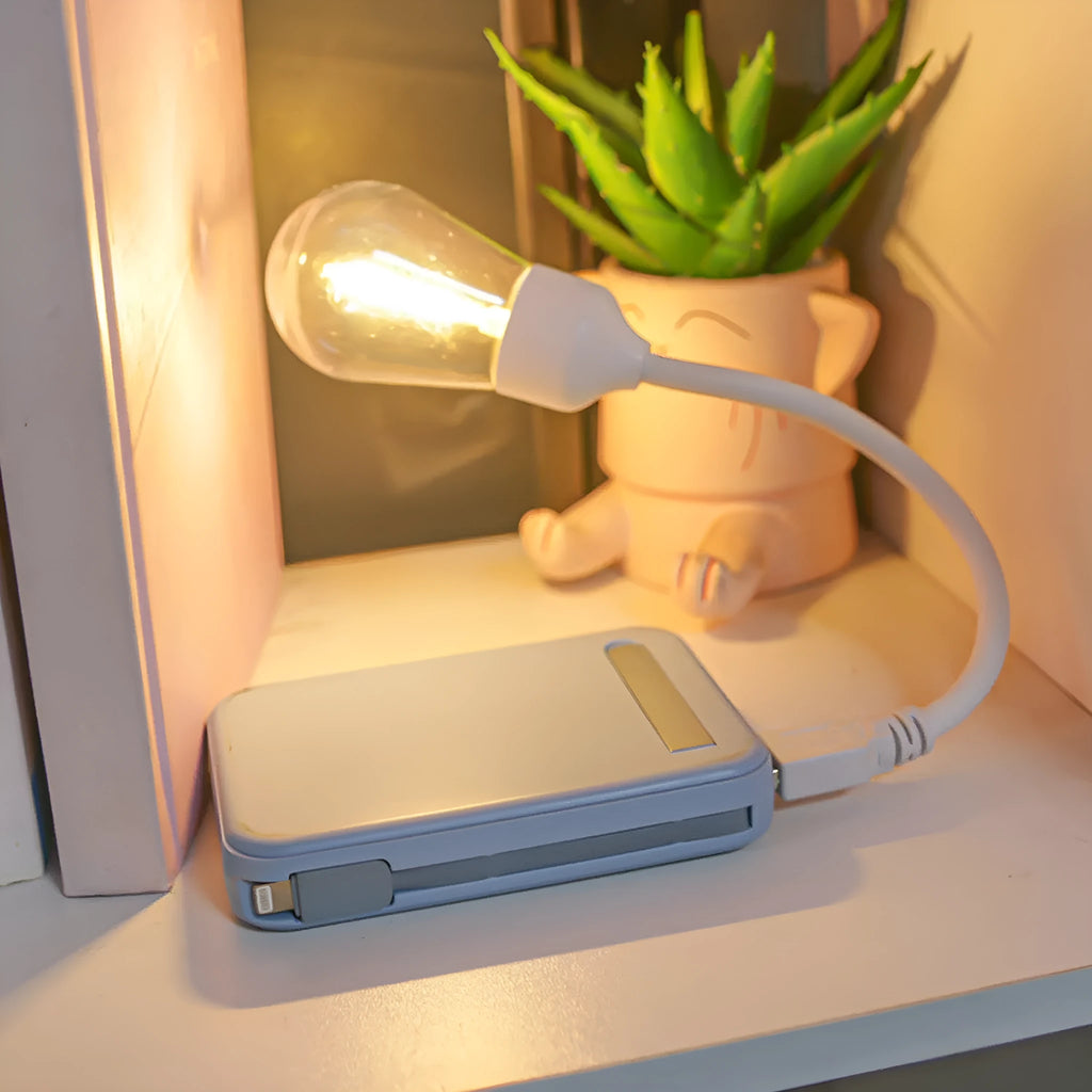 Folding USB rechargeable night light with tungsten filament bulb in warm white illumination