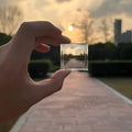 Pixel Stone Mosaic Filter My World keychain in acrylic, available in black, blue, and pink colour options