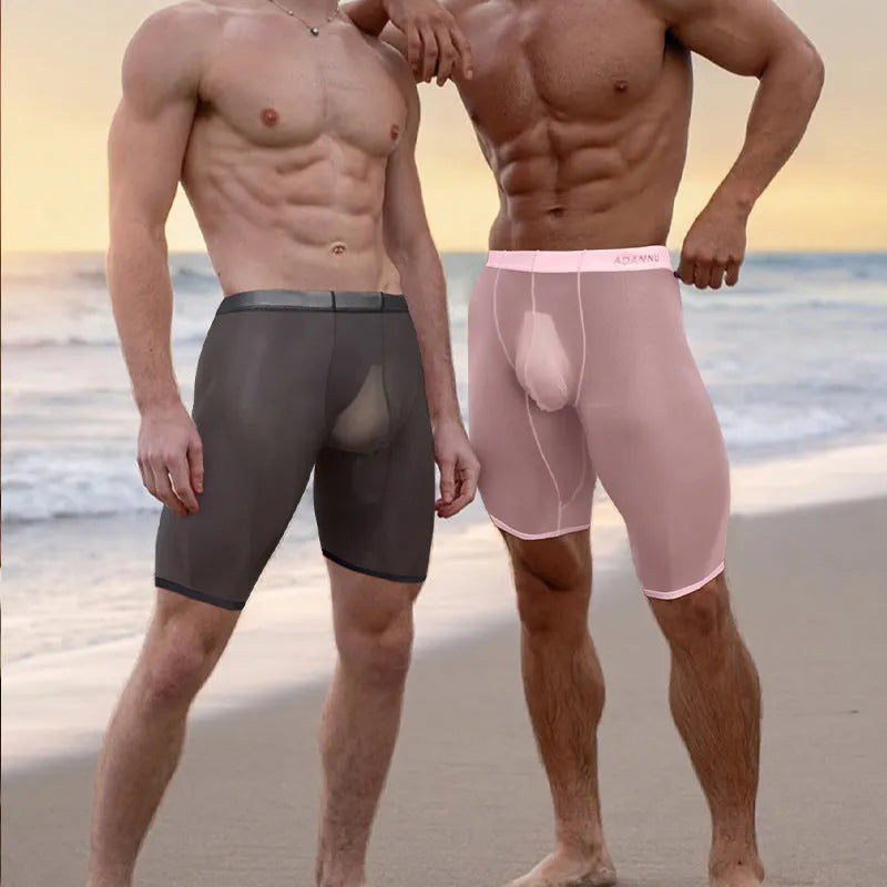 Men's solid colour mesh shorts in black, seamless knit construction.