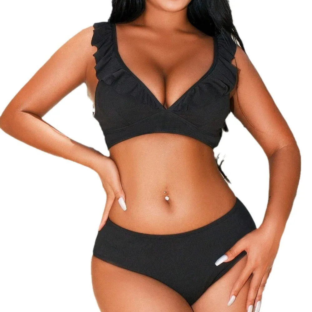 Women's high-elasticity nylon bikini set with split chest design in black stripes, backless back view