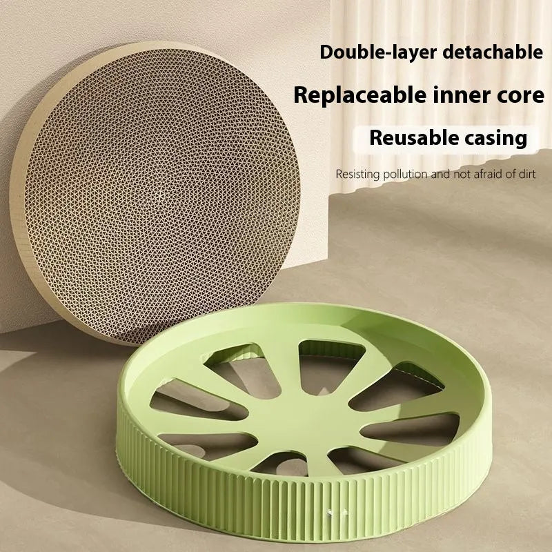 Round cat scratching board made from corrugated paper with green surface and two replacement pads on the side