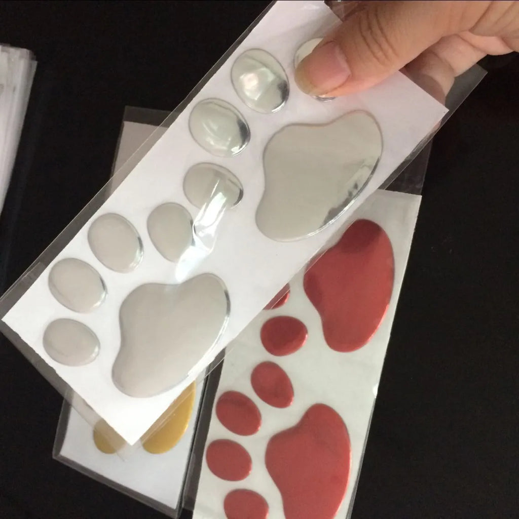 PVC car sticker with hand-shaped brush design and dog footprints pattern for bumper scratch coverage