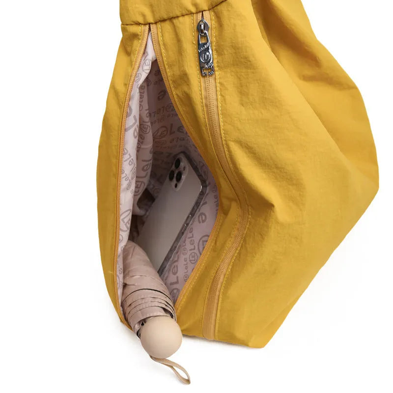 Heart-shaped women's nylon underarm bag in black, yellow, khaki, or blue with shoulder strap