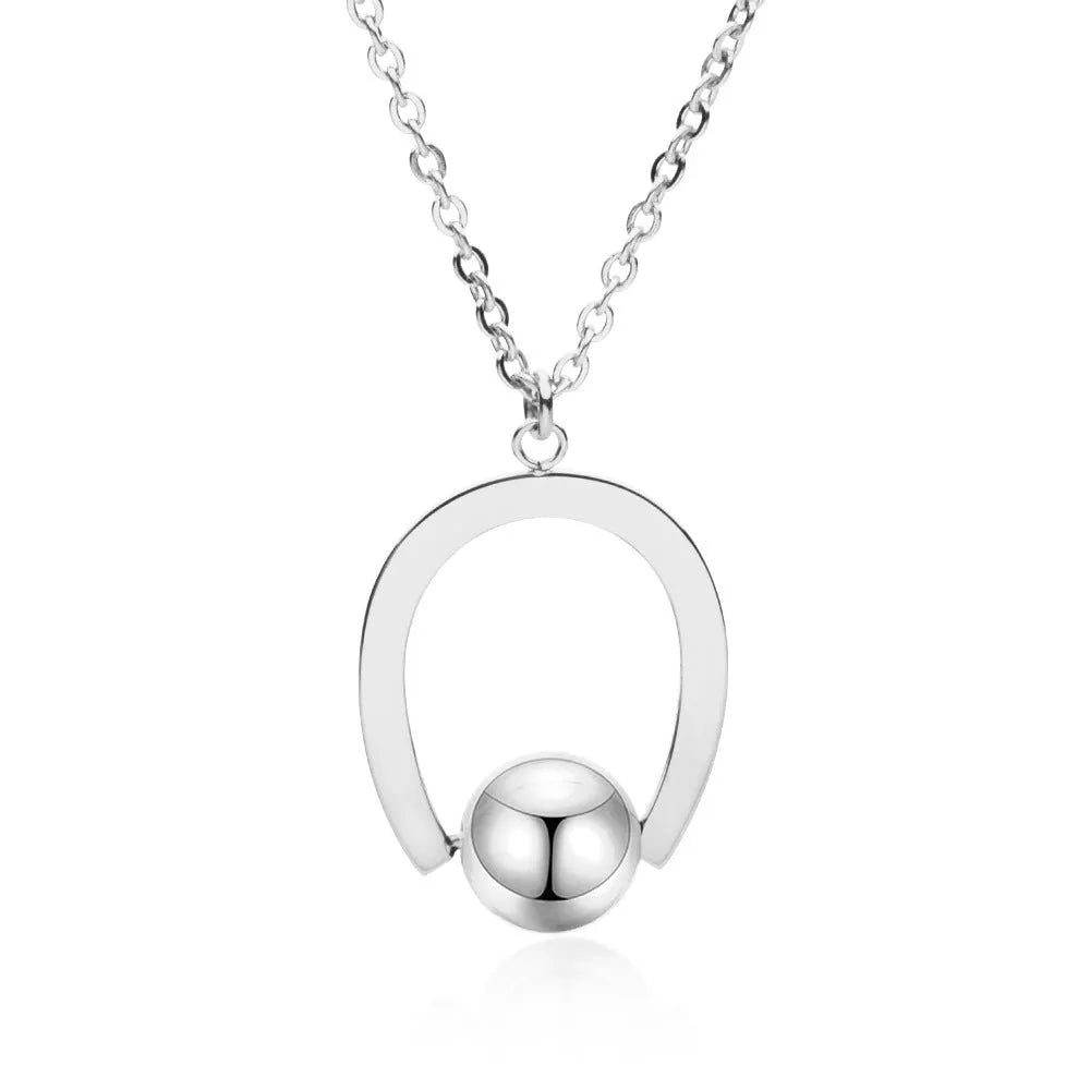Adjustable stainless steel cross chain necklace with geometric pendant in gold or silver finish