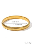 Women's vertical stripe elastic titanium steel bracelet in gold or silver finish with five width options