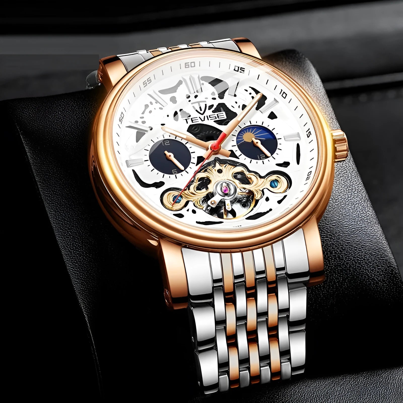 Men's black tourbillon skeleton watch with luminous hands on a leather strap.
