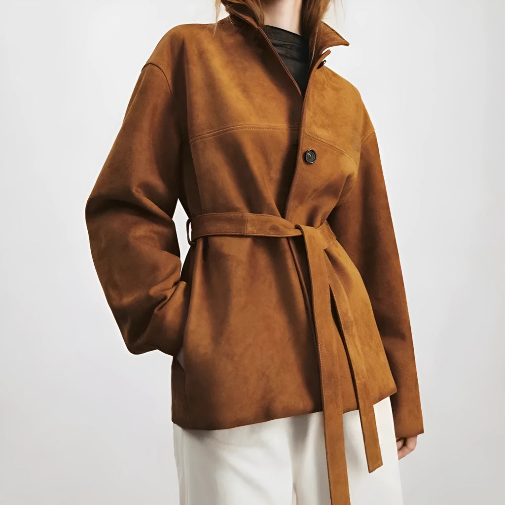 Brown cashmere coat with Peter Pan collar and leather stitching in retro art style