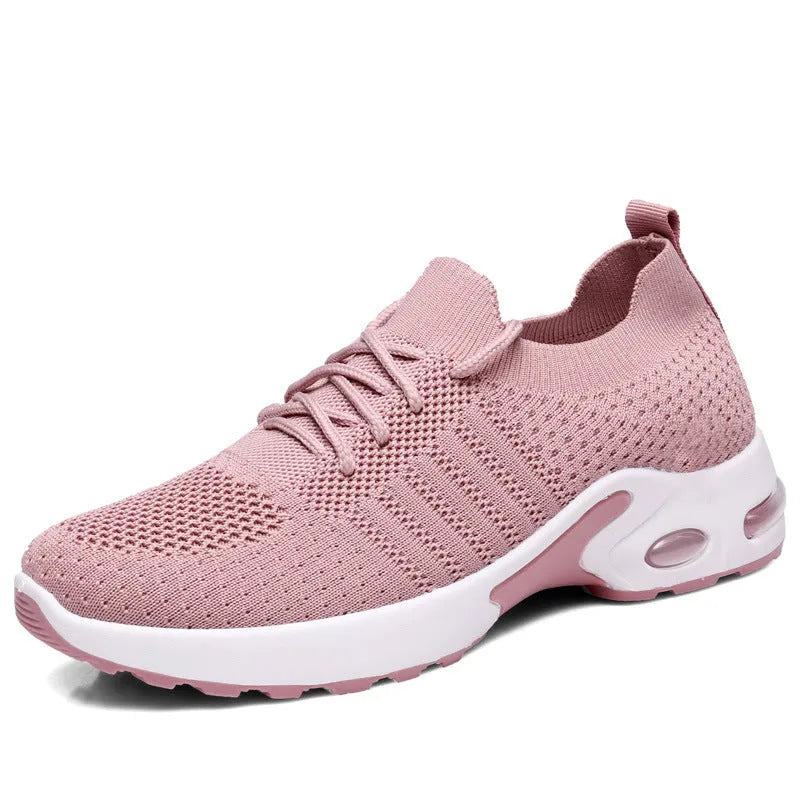 Women's black mesh casual sneakers with a round toe and white lace-up front.