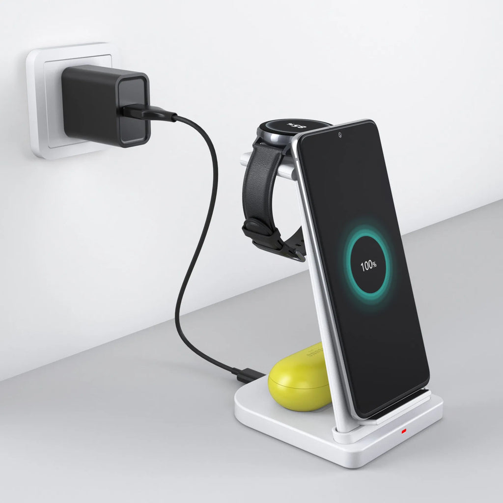 Three-in-one wireless charger for Samsung phone and watch in black with removable charging board and foldable watch stand on a table
