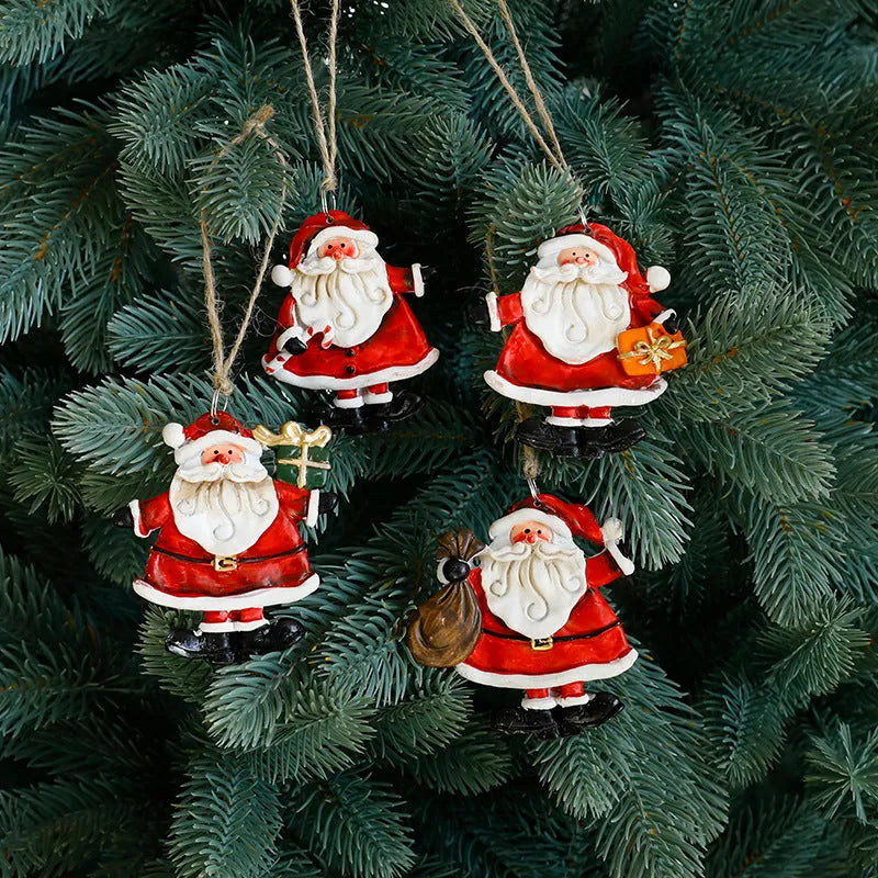 Small resin Christmas tree pendant ornament with a snowman figure holding a broom