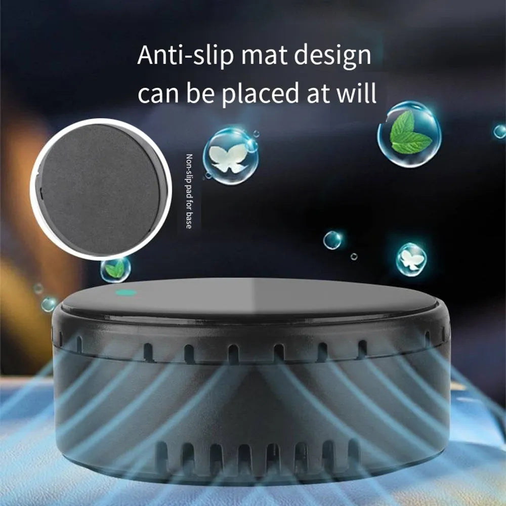 Black solar-powered car air humidifier mounted on a car air vent