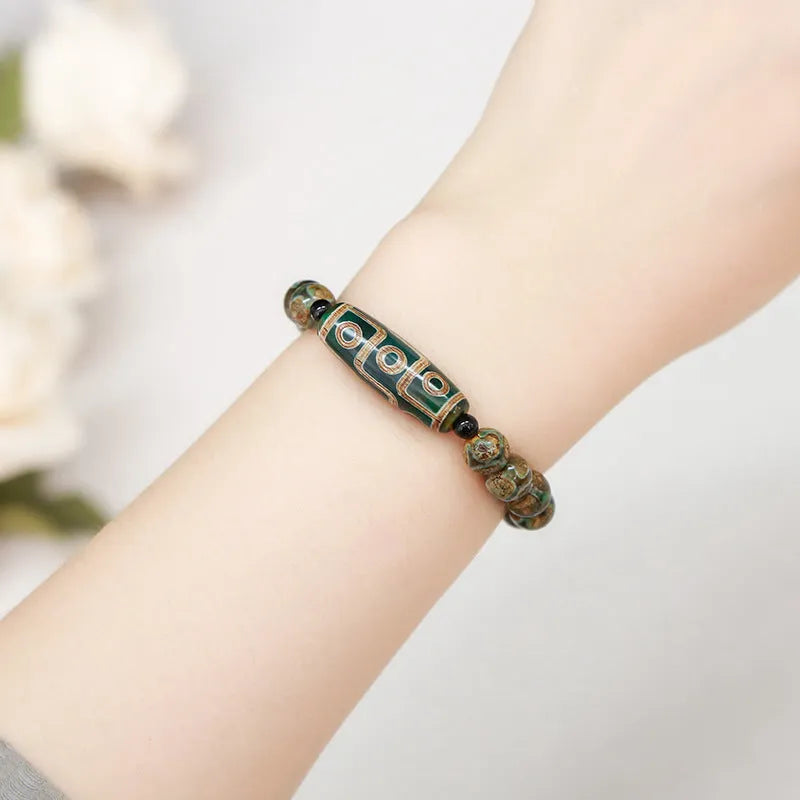 Green dzi bead barrel shaped bracelet with 8mm beads and handmade finish