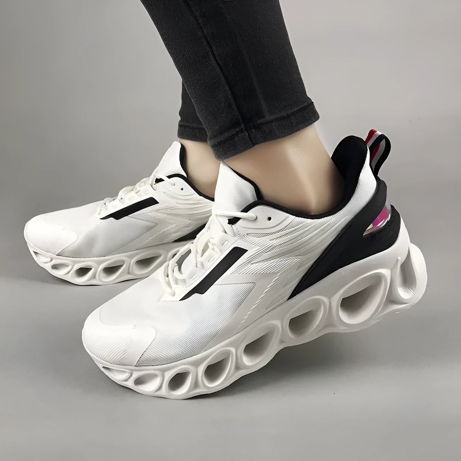 Men's low-top black breathable mesh casual sports shoes with a round toe and white lace-up fastening.