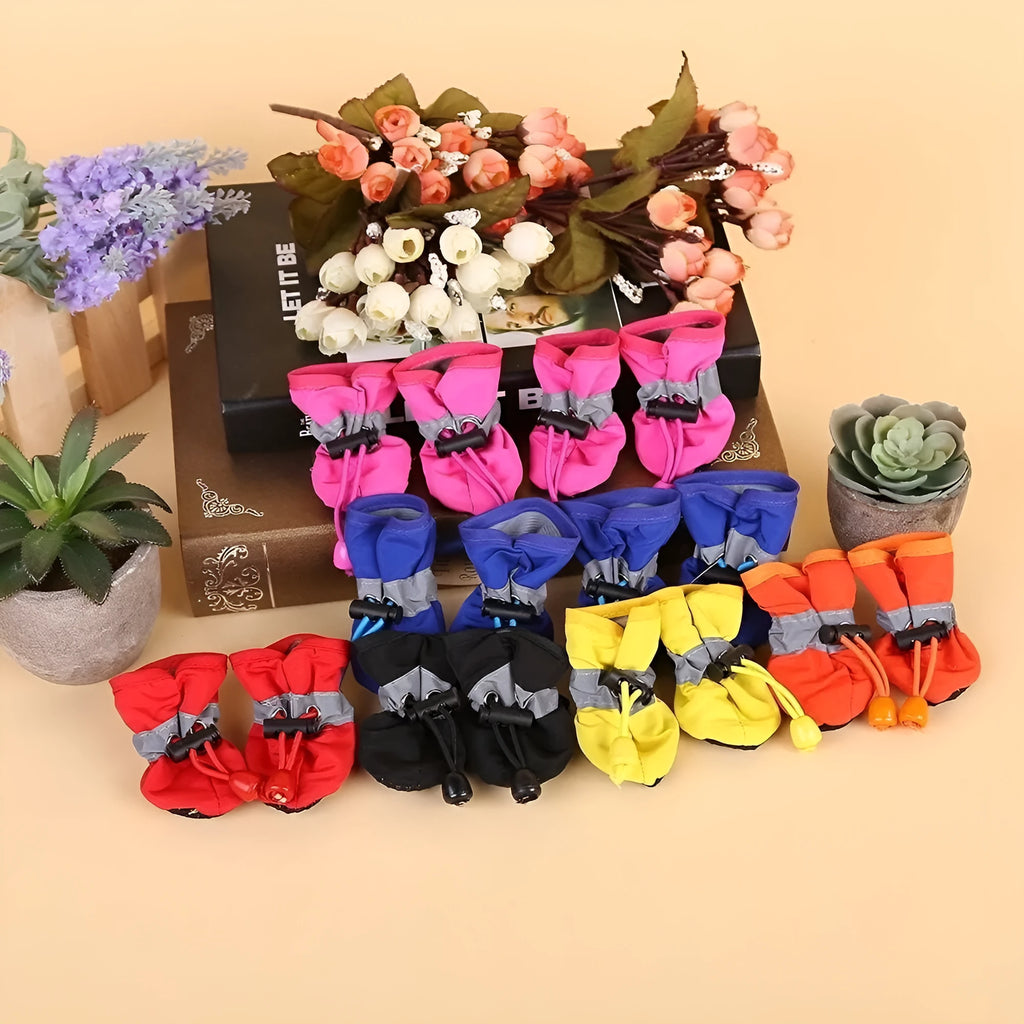 Pet dog four seasons breathable soft bottom non-slip cloth shoes in multiple colours and sizes on a white background.