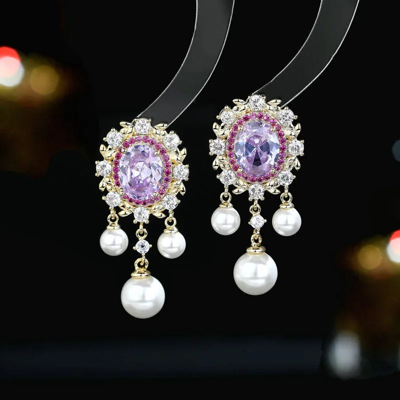 Oval-shaped geometric earrings with zircon inlay and pearl tassels in light purple colour