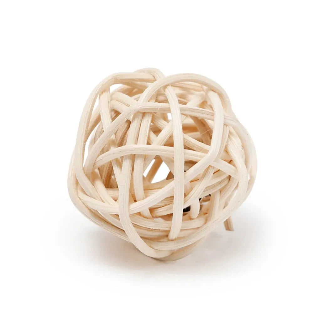 Cat toy set showing rattan ball with bell and faux feather ball on neutral background