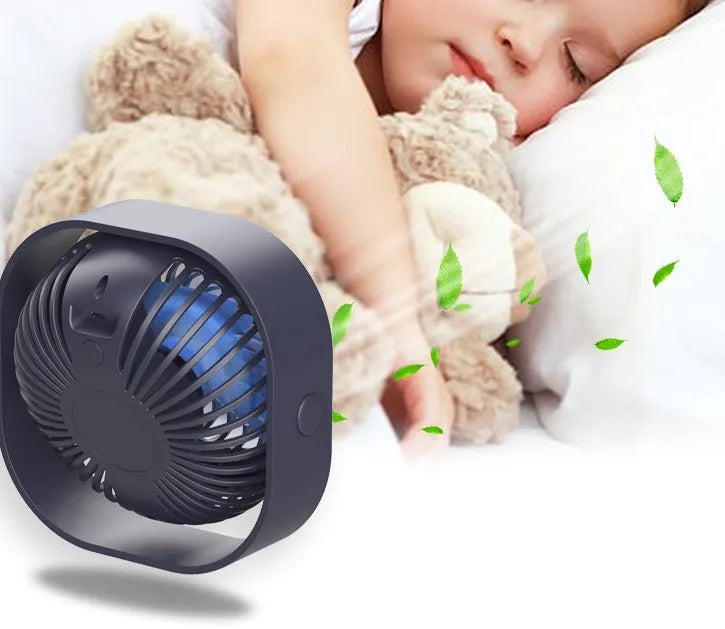 USB desk fan with alarm clock display in modern minimalist design, showing 360-degree rotation.