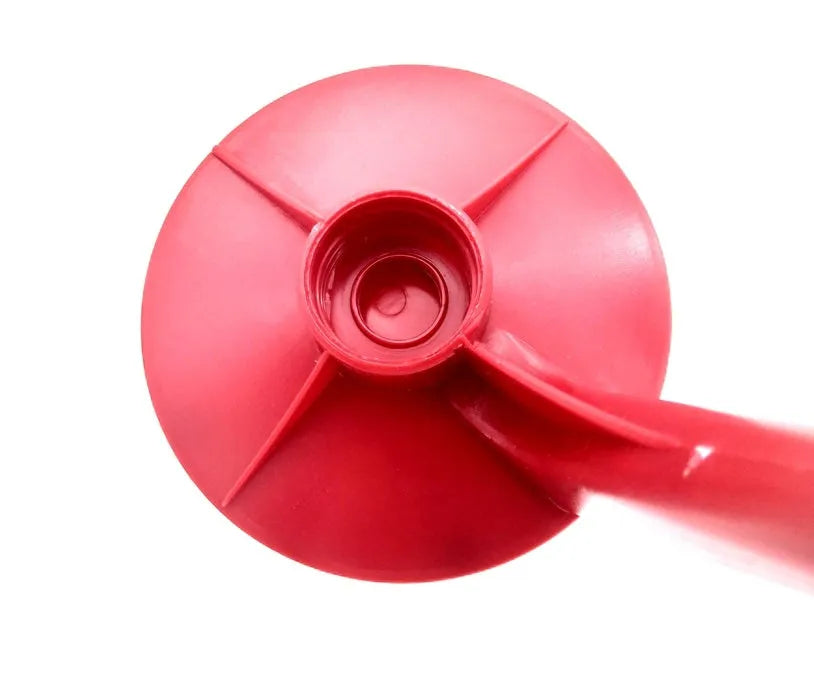 Red plastic Magic Tap soda dispenser mounted on inverted 2-litre bottle