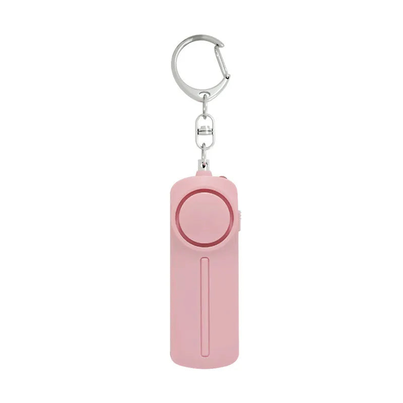 Girls personal safety alarm in pink colour showing compact 86x30x20mm ABS plastic design