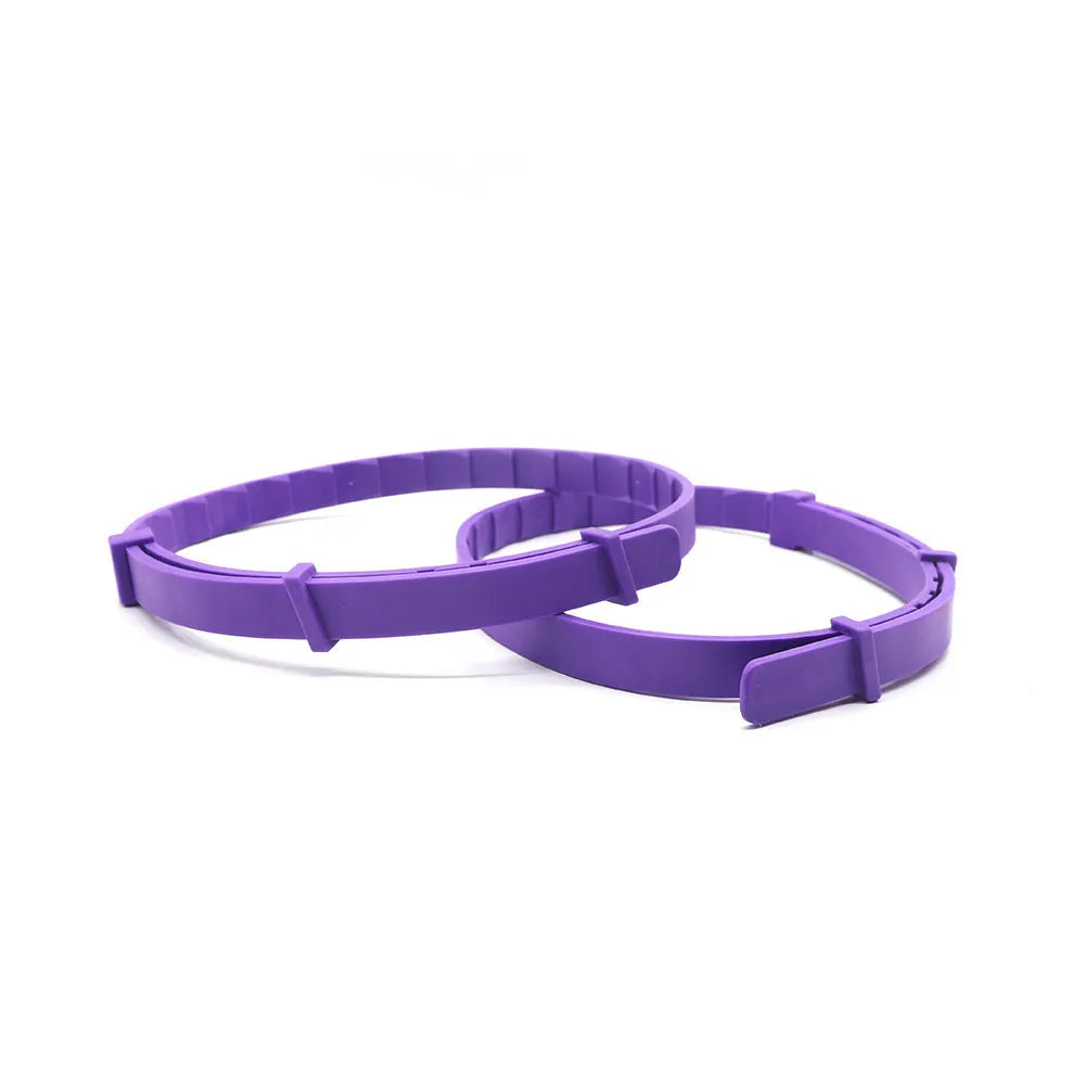 Four dog calming collars in different colours, showing TPR material and 62cm length.