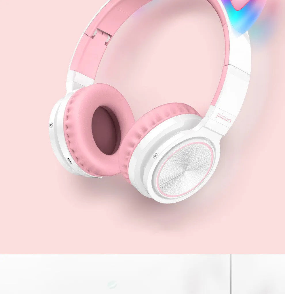 Pink white luminous Bluetooth headset with head-mounted design and protein ear pads