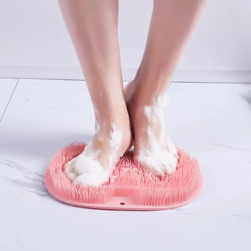 Non-slip bath mat with silicone bristles and suction cup base in a shower