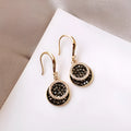 Black geometric alloy earrings with 3.6cm length in retro Hong Kong style