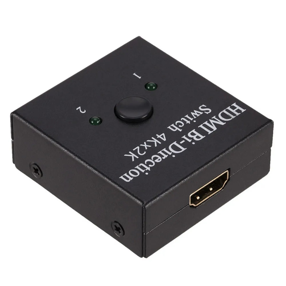 HDMI switcher 2 in 1 out in black plastic casing with two input ports and one output port