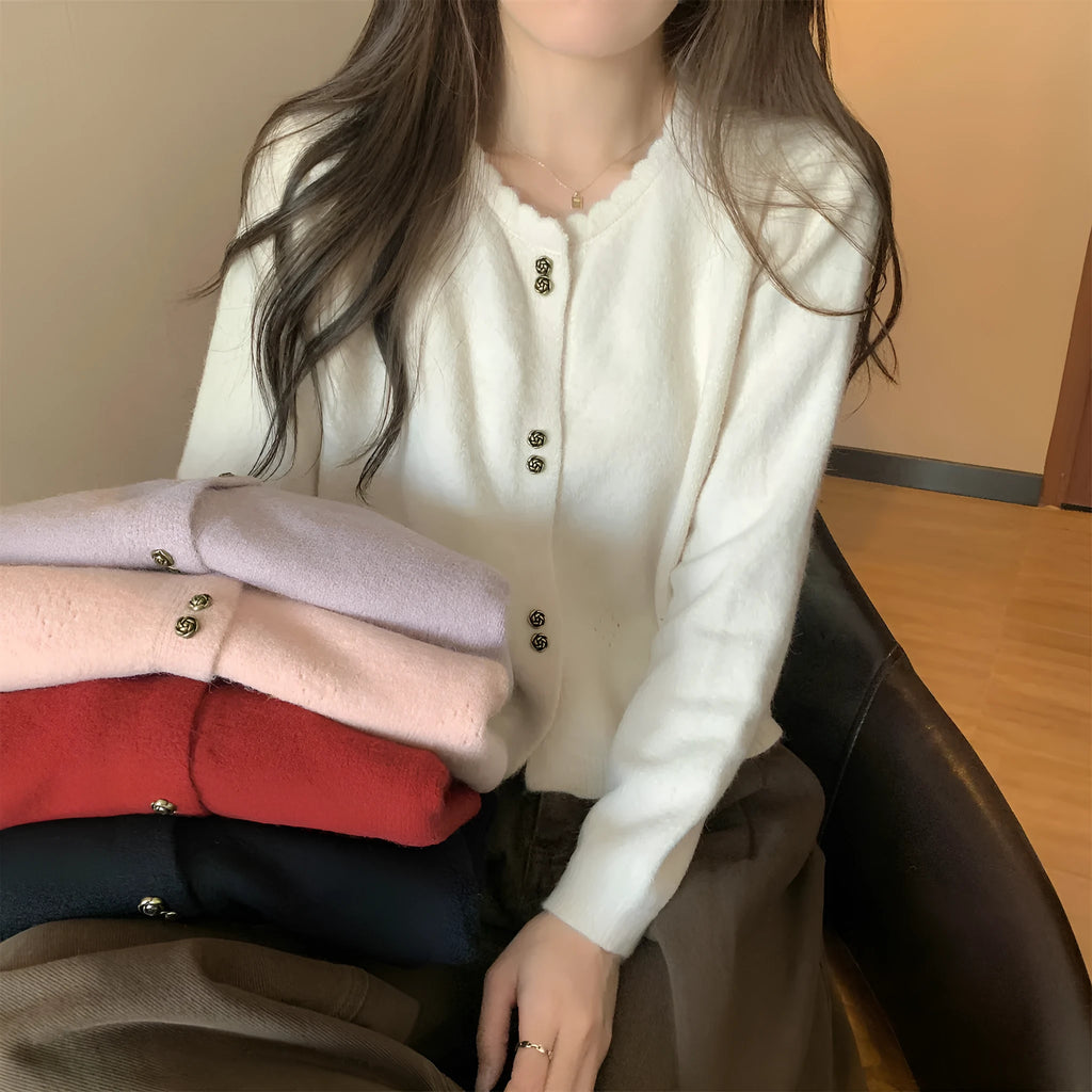 Women's long-sleeved acrylic cardigan coat in milky white, shown as a casual layering piece.